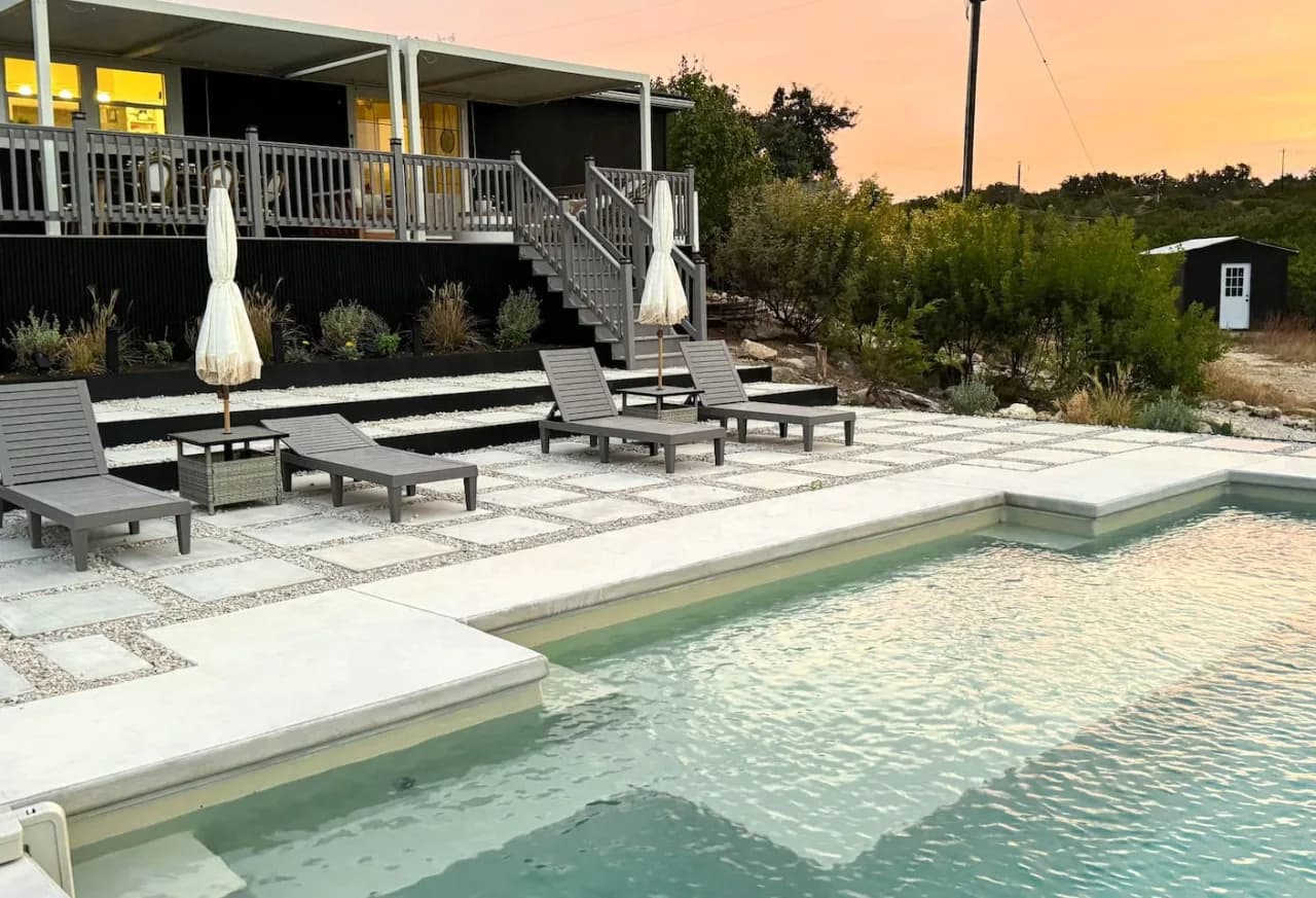 Hill Country home with a pool, patio, and open outdoor setting